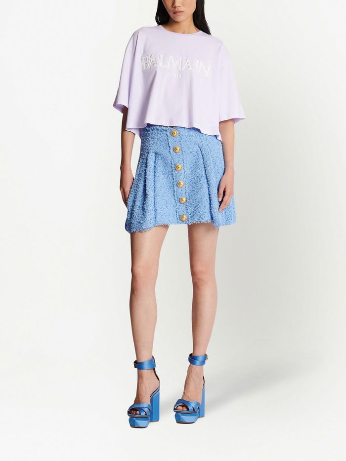 BALMAIN WOMEN Roman Rubber Logo Cropped T-Shirt Light Lilac/White - MAISONDEFASHION.COM