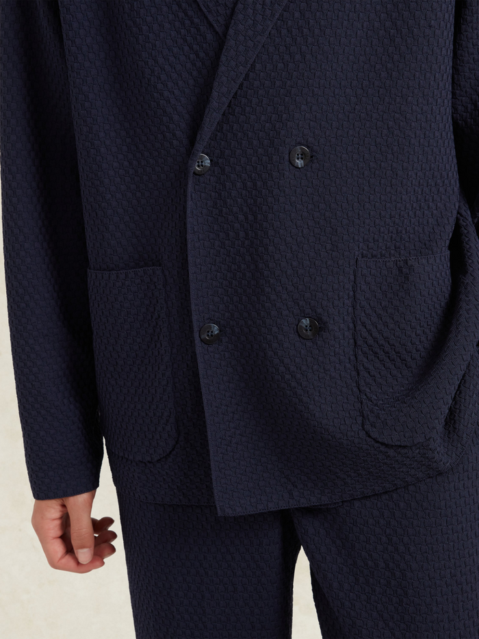 CHÉ Garcia Knitted Blazer Navy - Close-up detail of knitted fabric weave, button details, and lapel construction