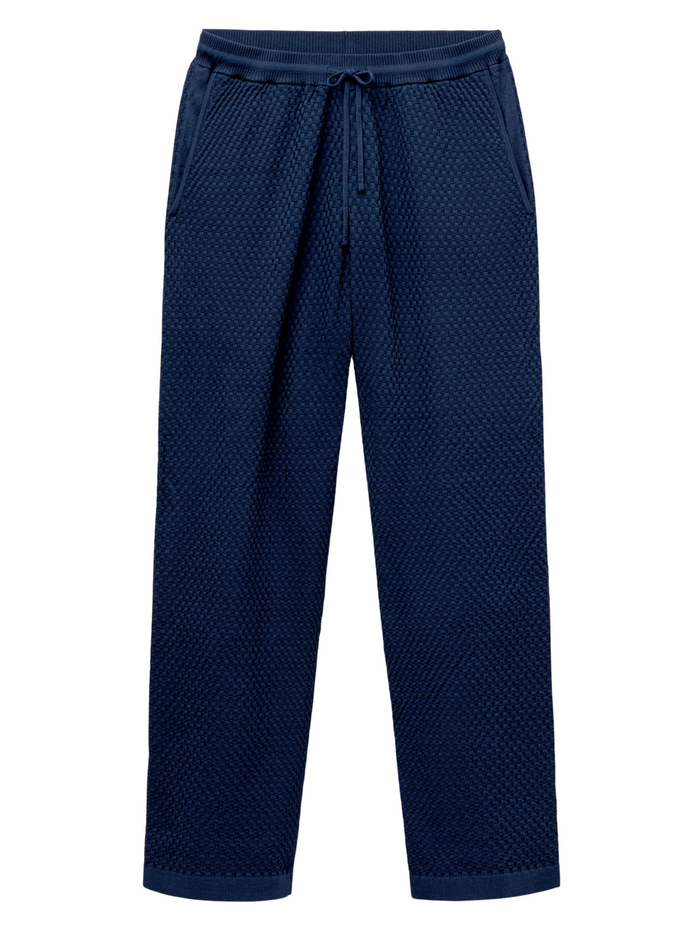 CHÉ Garcia Knitted Trousers in Navy - front view showing full-length knitted trousers with CHÉ branding