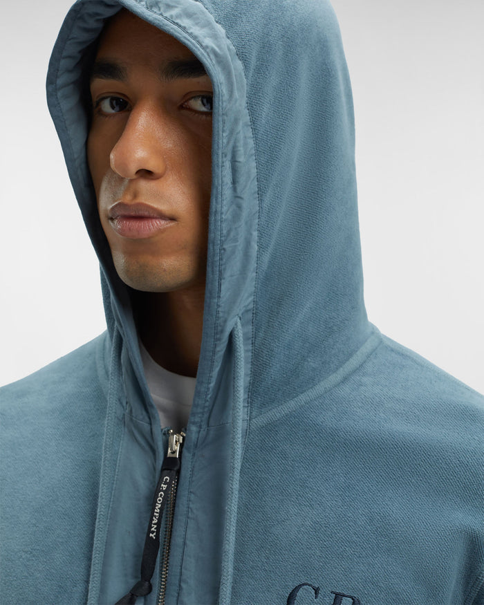 C.P. COMPANY Reverse Brushed & Emerized Diag. Fleece Zipped Hoodie Blue - MAISONDEFASHION.COM