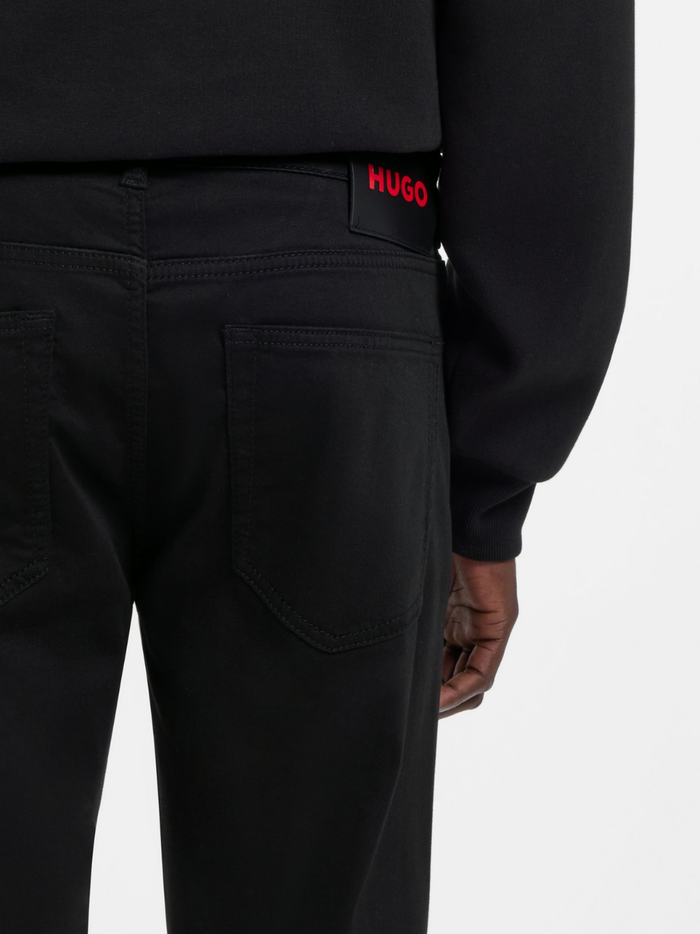 HUGO 734 Extra-Slim-Fit Jeans In Satin-Touch Denim Black - MAISONDEFASHION.COM