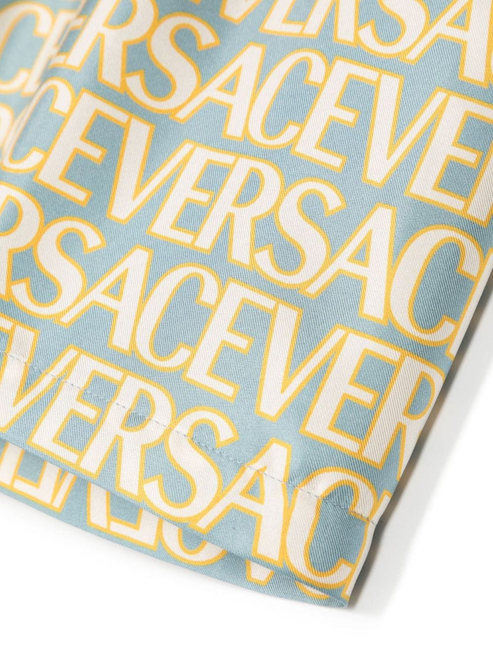 VERSACE KIDS All Over Logo Print Shorts Light Blue/Ivory - MAISONDEFASHION.COM