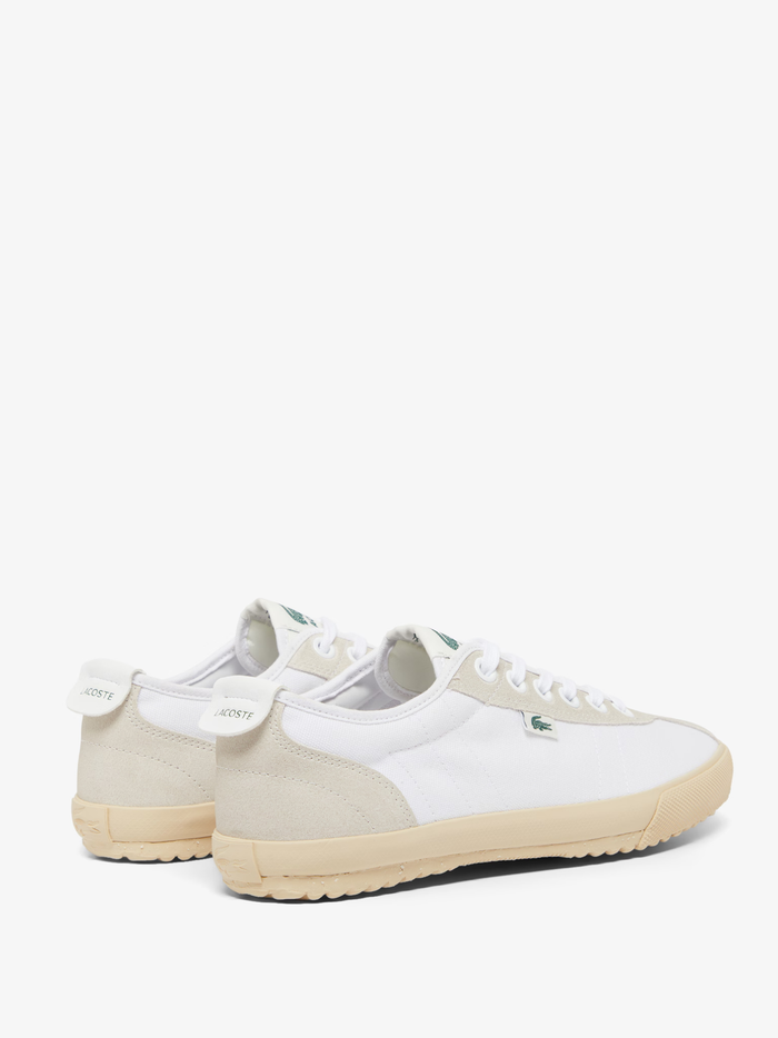 LACOSTE Backslam sneakers back view showing tan suede heel counter with white LACOSTE branding