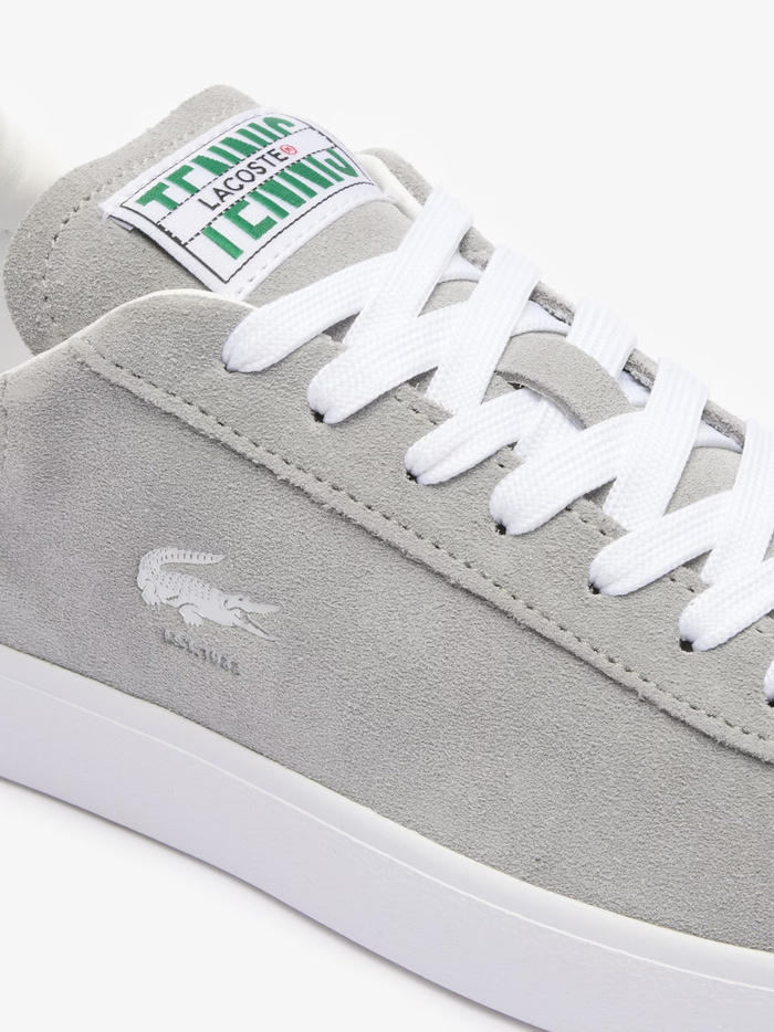 LACOSTE Baseshot Translucent Sole Sneakers in Grey/White - close-up detail of embroidered crocodile logo and premium materials with translucent sole feature