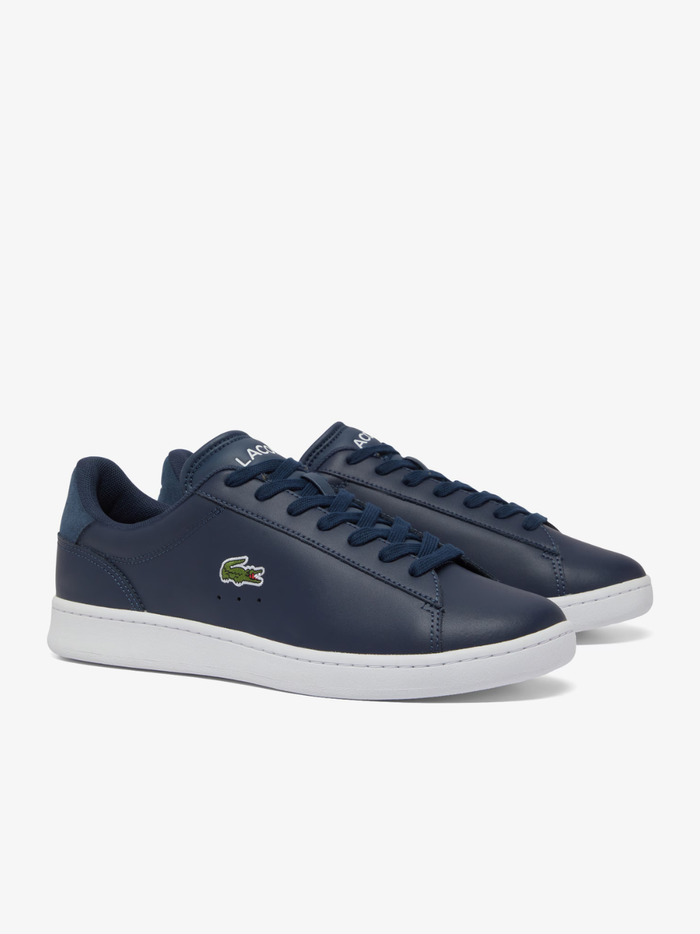 LACOSTE Carnaby Set Navy and White Leather Sneakers - Inner Side View Showing Premium Leather Construction and White Detailing