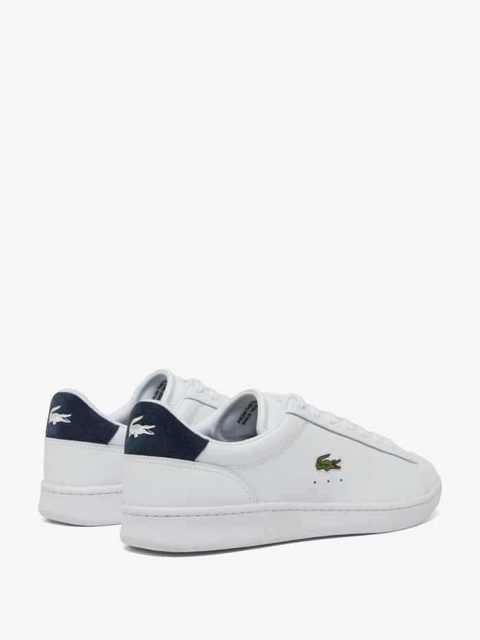 LACOSTE Carnaby Set sneakers back view showing navy blue heel counter with white LACOSTE branding