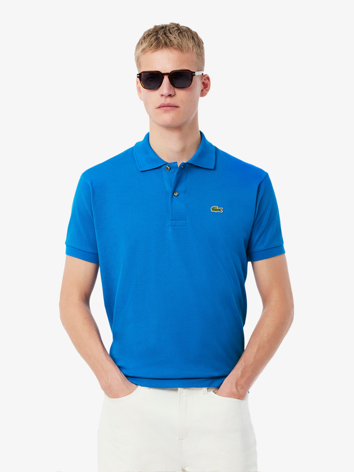 LACOSTE Classic Fit L.12.12 Original Polo Shirt in Denim Blue - back view displaying clean lines and classic fit silhouette