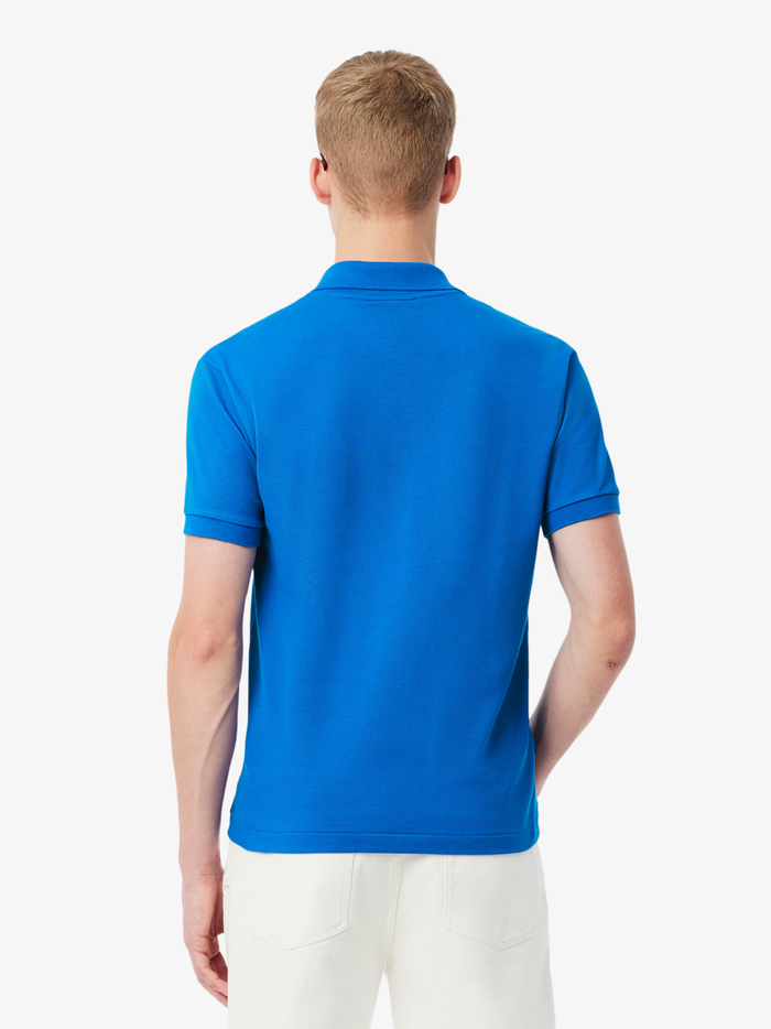 LACOSTE Classic Fit L.12.12 Original Polo Shirt in Denim Blue - lifestyle shot or fabric detail highlighting quality and texture