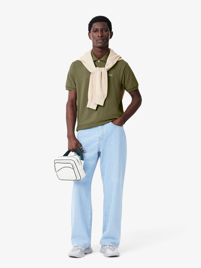 LACOSTE Classic Fit L.12.12 Original Polo Shirt in Khaki Green - side view highlighting the classic fit silhouette and short sleeves