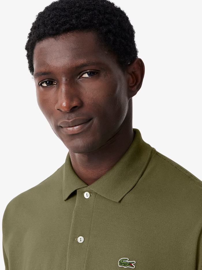 LACOSTE Classic Fit L.12.12 Original Polo Shirt in Khaki Green - detail shot of the signature LACOSTE crocodile emblem and polo collar