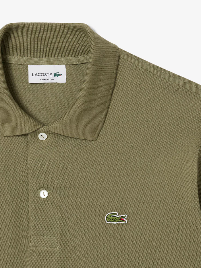 LACOSTE Classic Fit L.12.12 Original Polo Shirt in Khaki Green - lifestyle shot showing the timeless styling and versatile fit