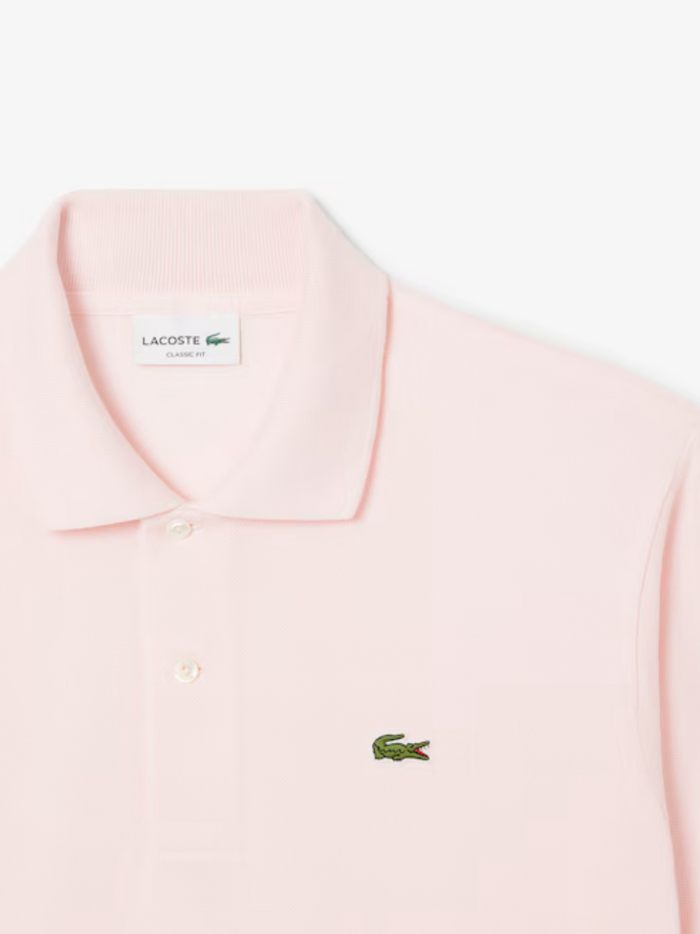 LACOSTE Classic Fit L.12.12 Original Polo Shirt - lifestyle shot or flat lay showcasing complete design in Light Pink