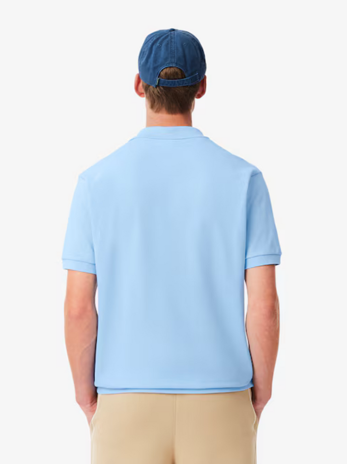 LACOSTE L.12.12 polo shirt in Pale Blue - collar and button placket detail featuring classic polo styling