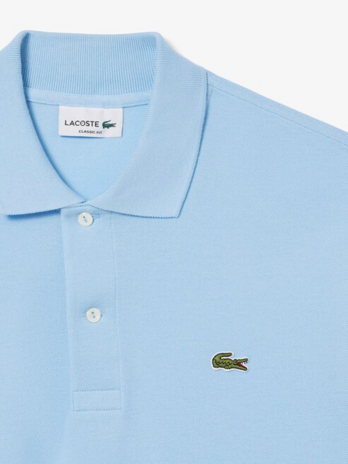 LACOSTE Classic Fit L.12.12 Original Polo Shirt - lifestyle shot or flat lay showcasing complete design in Pale Blue