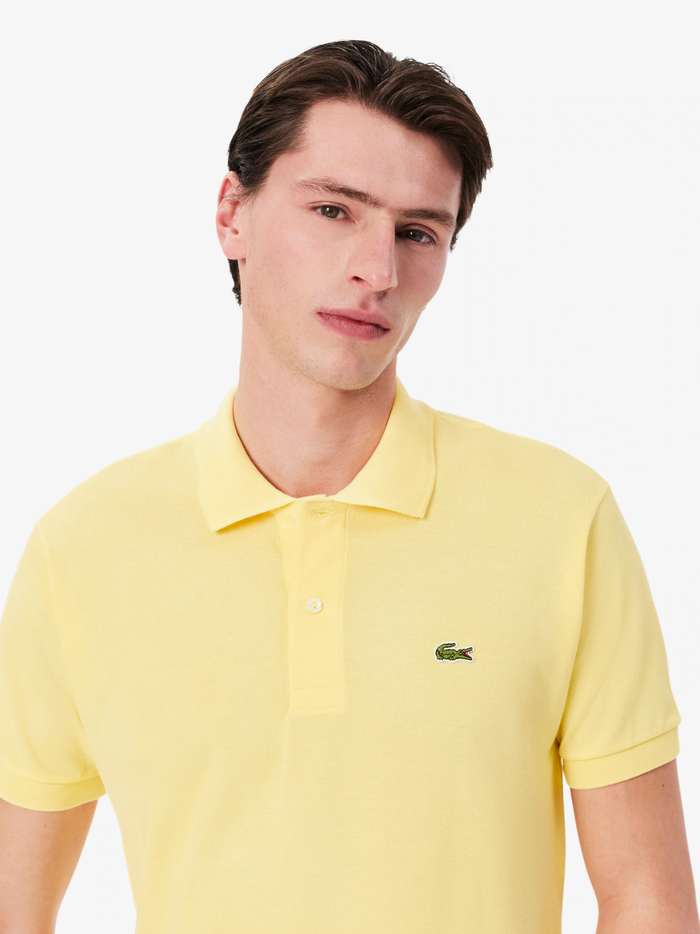 LACOSTE Classic Fit L.12.12 Original Polo Shirt in Pastel Yellow - Close-up of Two-Button Placket and Ribbed Collar Detail