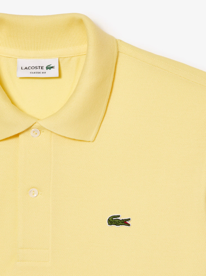 LACOSTE Classic Fit L.12.12 Original Polo Shirt in Pastel Yellow - Full Front View Highlighting Timeless Classic Design