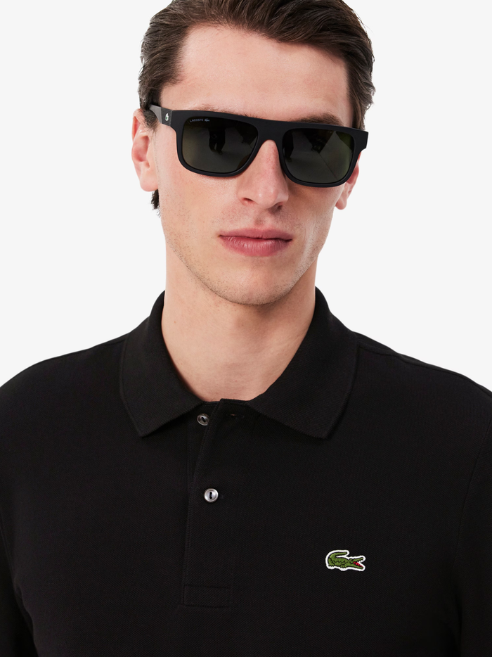 LACOSTE Classic Fit Long Sleeved L.12.12 Polo Shirt in Black - Close-up of Collar and Buttons