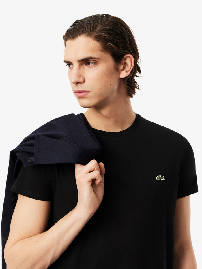 LACOSTE Cotton Pima T-shirt Black - close-up detail of the embroidered crocodile logo and soft cotton texture