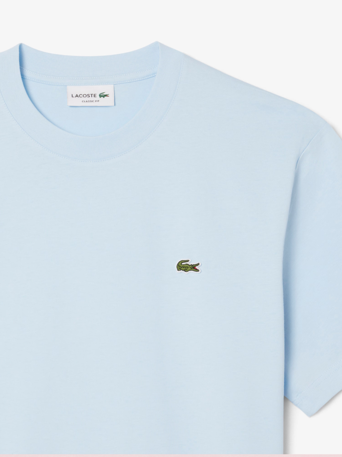 LACOSTE Cotton T-shirt Light Blue - lifestyle shot showing versatile styling options