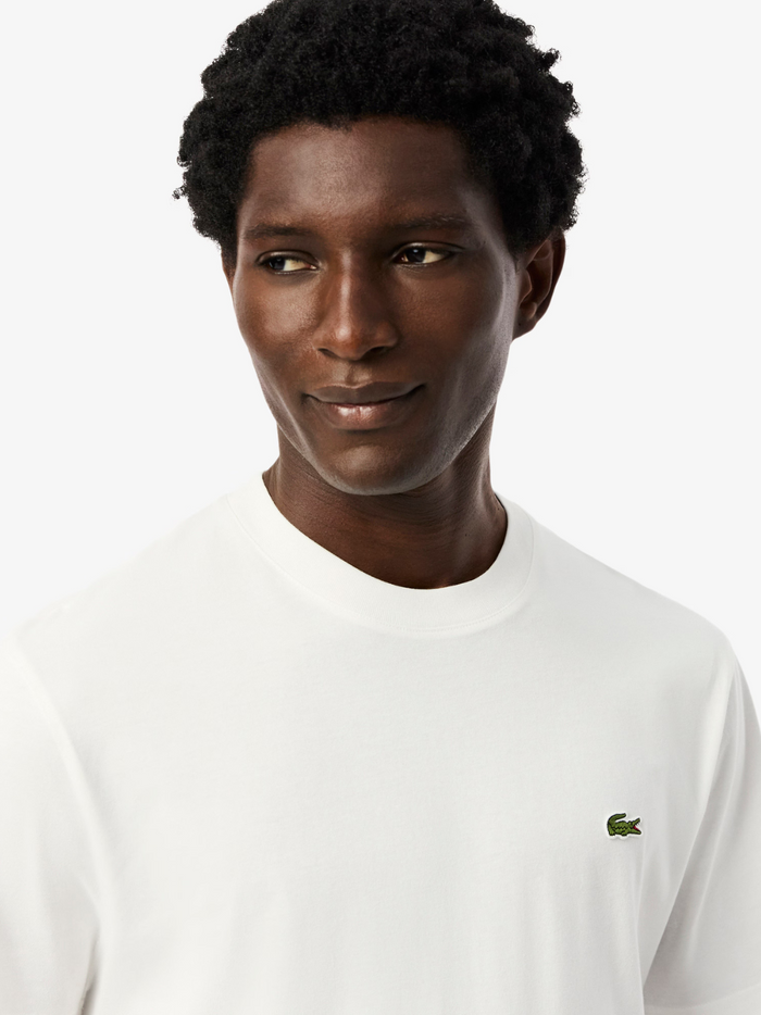 LACOSTE Cotton T-shirt White - close-up detail of the embroidered crocodile logo and soft cotton texture