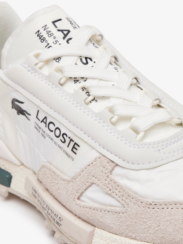 LACOSTE Elite Active Sneakers in White/Dark Green - close-up detail of embroidered crocodile logo and premium materials