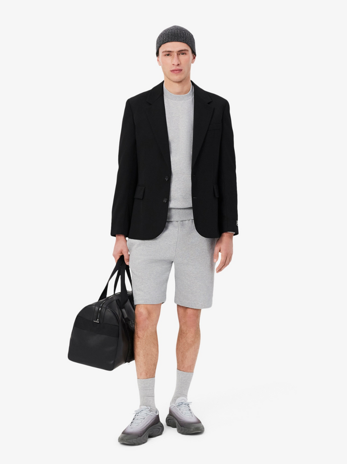 LACOSTE Fleece Crew Neck Sweatshirt Grey - side profile view highlighting the relaxed fit and sleeve construction