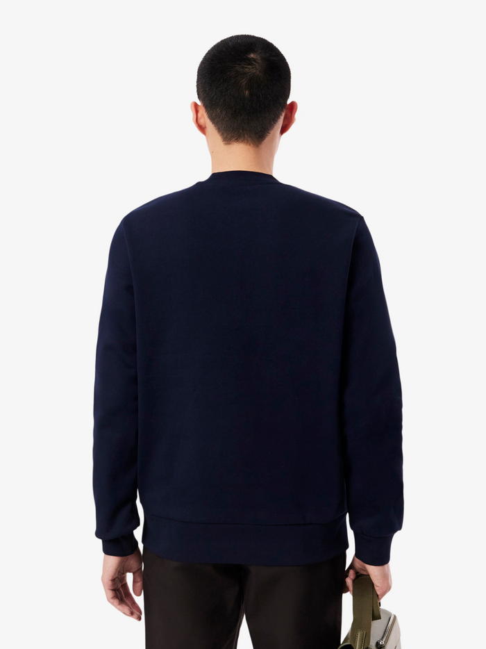 LACOSTE Midnight Blue crew neck sweatshirt - lifestyle shot or alternative angle showcasing versatile styling