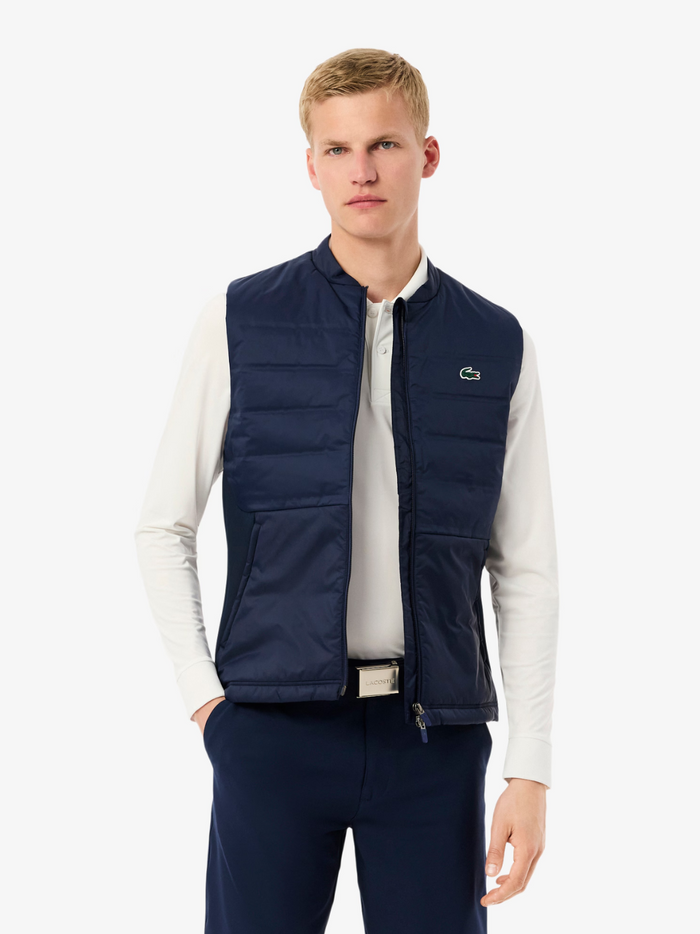 LACOSTE Navy Golf Quilted Vest - back view displaying the vest's silhouette and quilted construction
