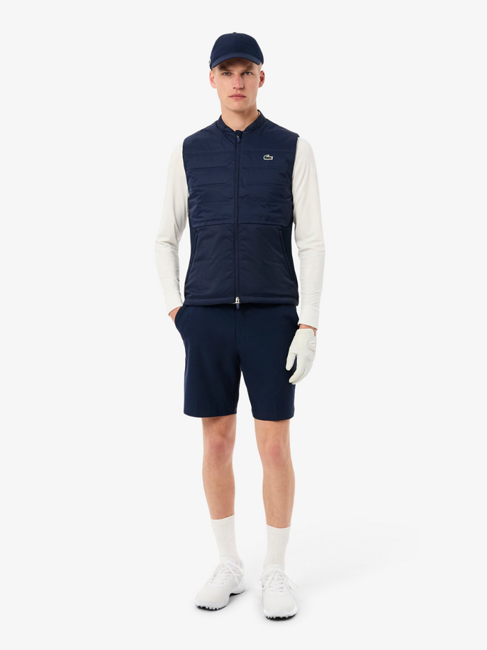 LACOSTE Golf Vest Navy - side profile view showing the vest's fit and quilted pattern detail