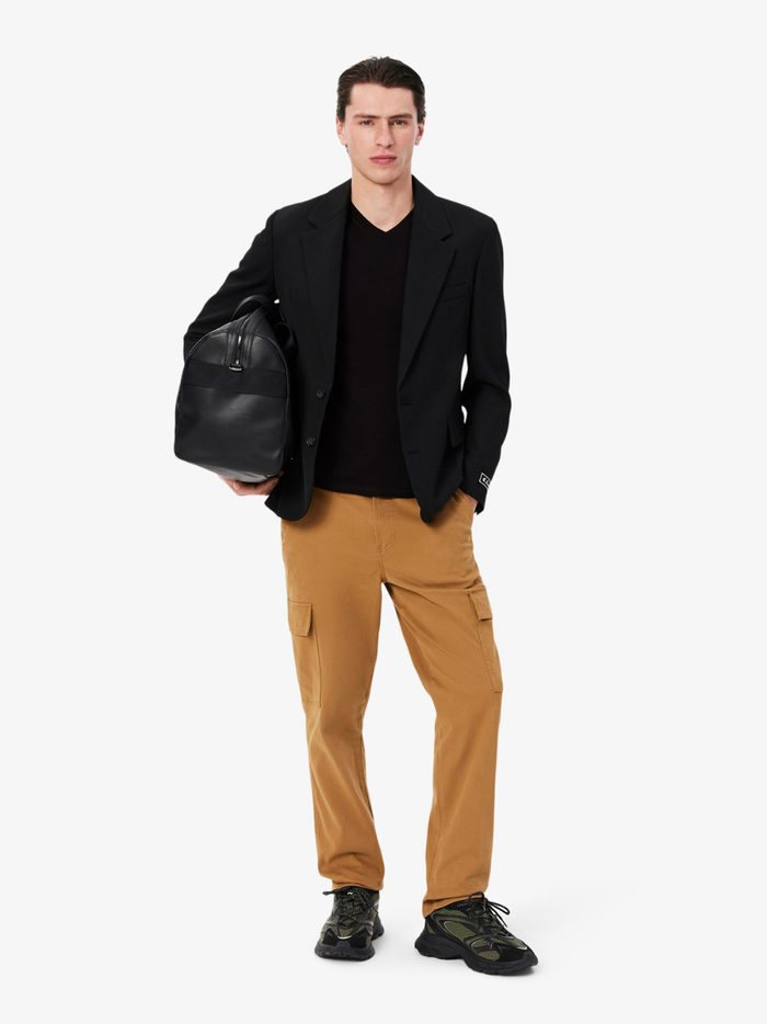 LACOSTE V Neck T-shirt in Black - side profile view highlighting lightweight cotton construction and tailored fit