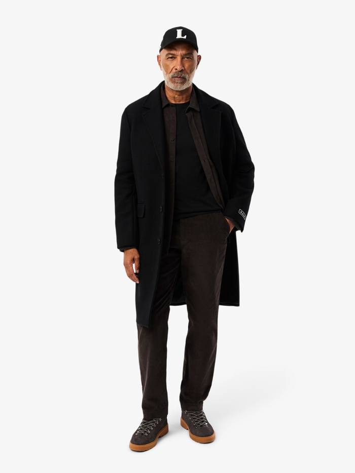 LACOSTE Long Sleeved Cotton Pima T-shirt in Black - side view highlighting the comfortable long sleeve silhouette