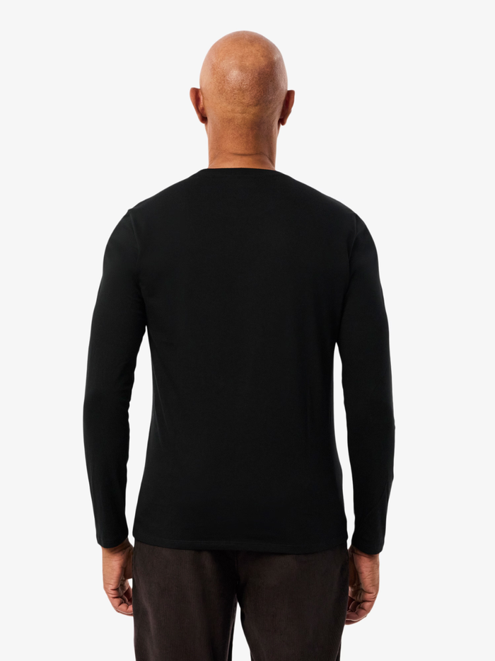 LACOSTE Long Sleeved Cotton Pima T-shirt in Black - close-up of premium Pima cotton fabric texture and quality
