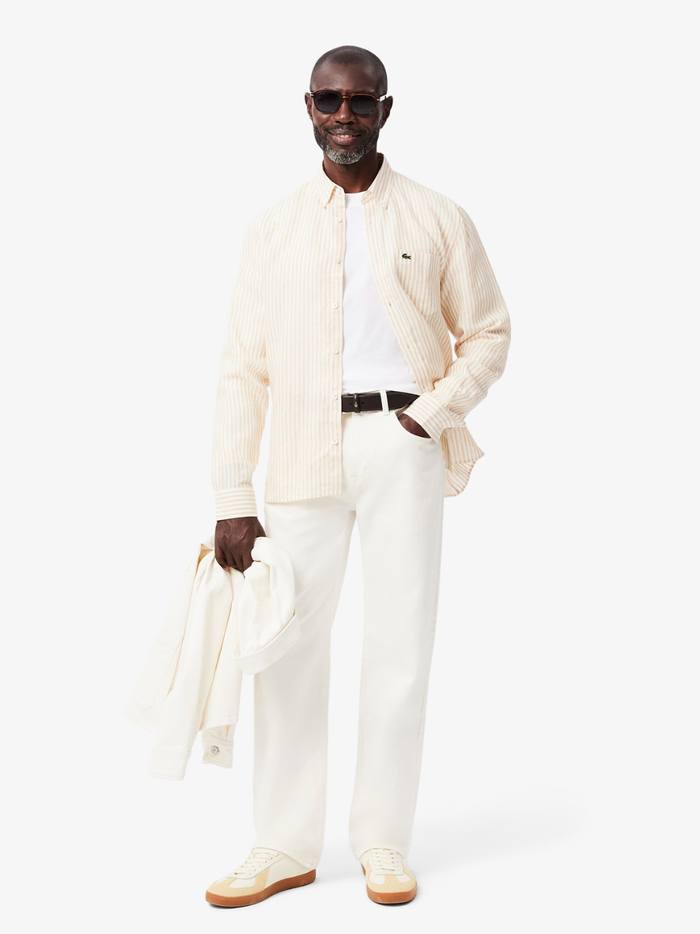 LACOSTE Long Sleeved Cotton T-shirt in White - side view highlighting the comfortable long sleeve silhouette