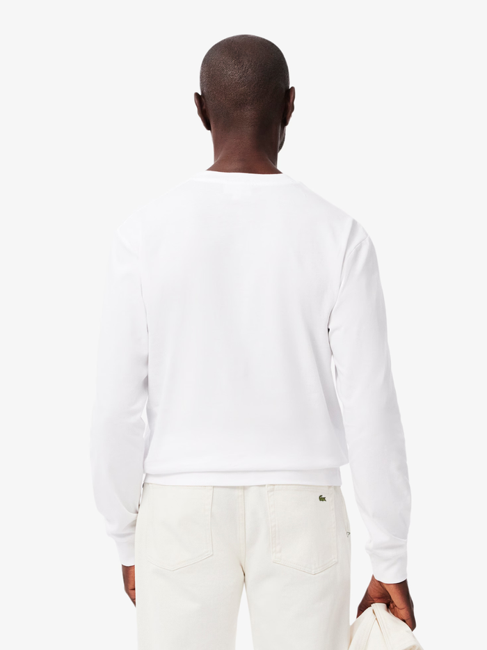 LACOSTE Long Sleeved Cotton T-shirt in White - close-up of premium cotton fabric texture and quality