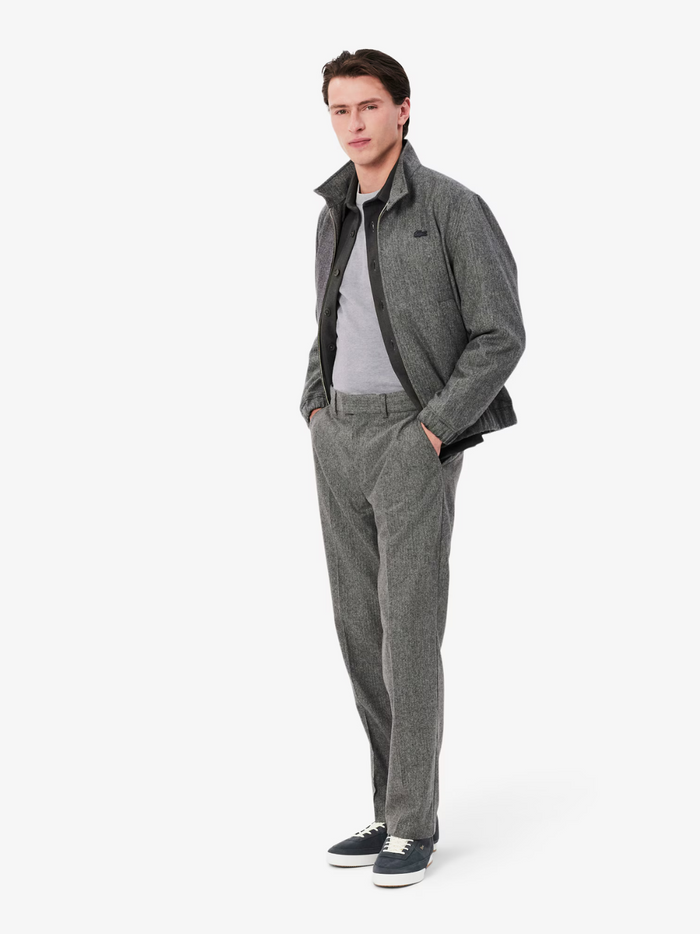 : LACOSTE Crew Neck Sweater Grey - Side profile showing relaxed fit and ribbed cuffs detail