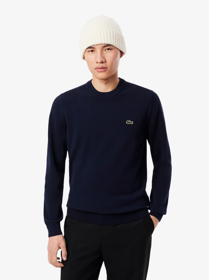 LACOSTE midnight blue crew neck cotton sweater back view showing clean monochrome design and premium fabric construction