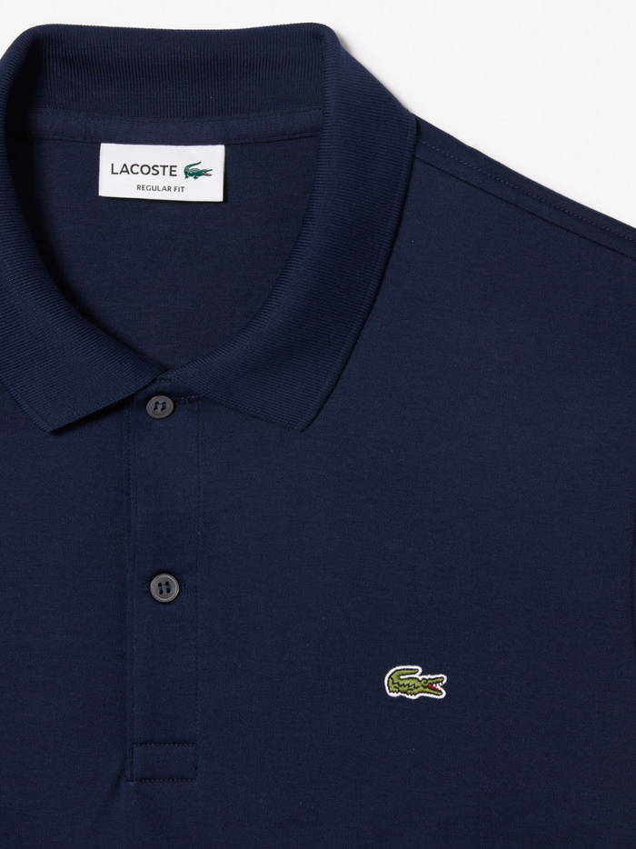 LACOSTE Regular Fit Cotton Pima Polo Shirt in midnight blue - styled view showcasing the sophisticated and versatile midnight blue colour