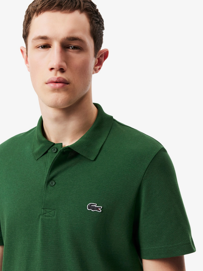 LACOSTE Green Polo Shirt - Close-up detail of collar and button placket showing quality construction
