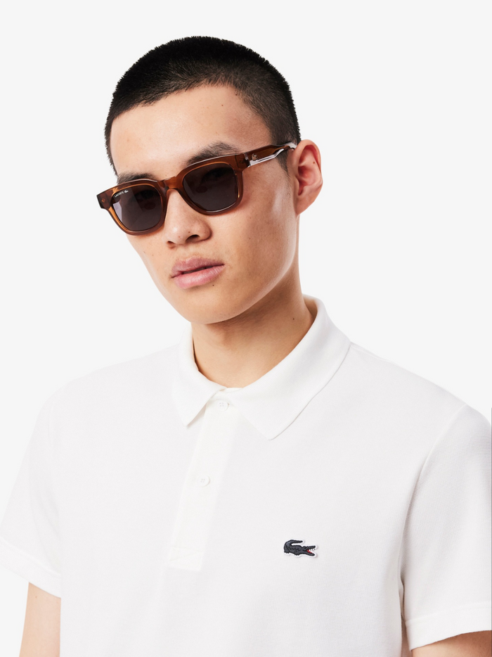LACOSTE White Polo Shirt - Close-up detail of collar and button placket showing quality construction and craftsmanship