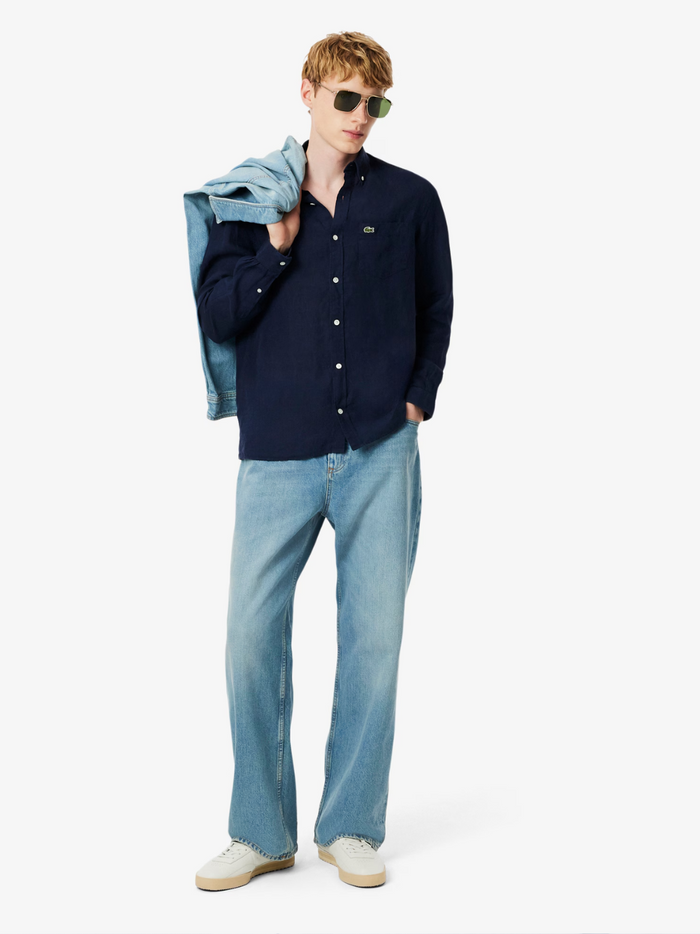 Close-up detail of LACOSTE Regular Fit Linen Shirt showing midnight blue linen texture, button quality and craftsmanship