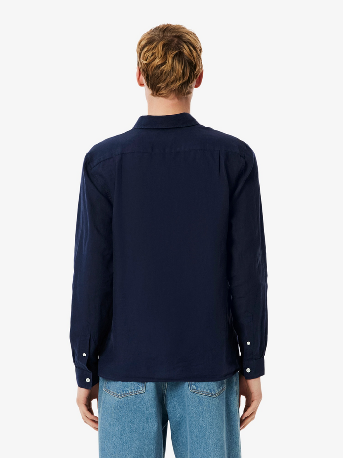 LACOSTE Regular Fit Linen Shirt collar and chest detail featuring the iconic LACOSTE crocodile logo on midnight blue linen