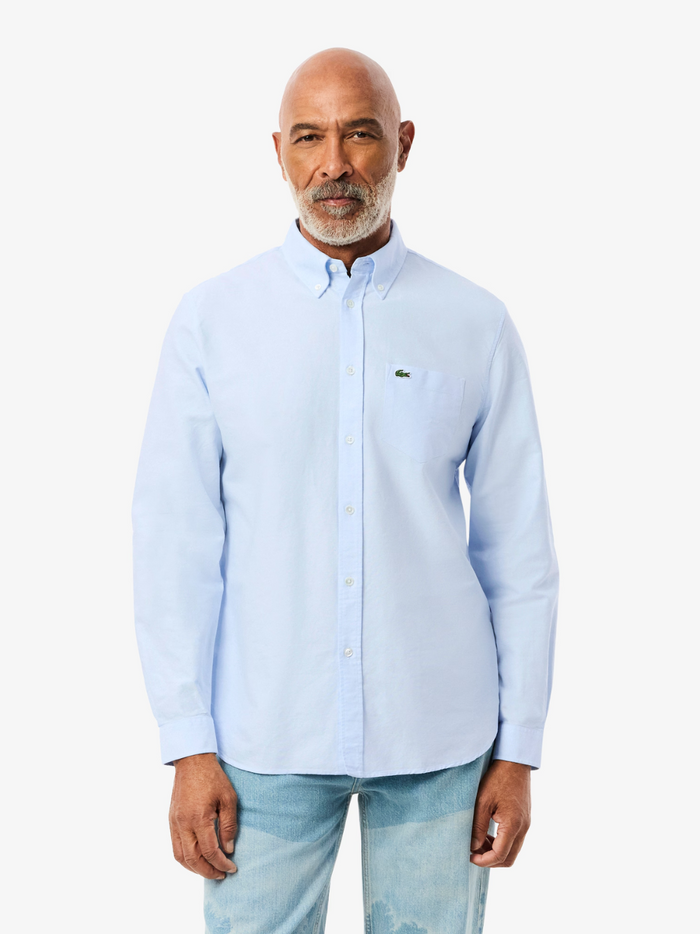 LACOSTE Regular Fit Oxford Shirt in light blue - back view displaying the shirt's tailored regular fit and premium Oxford cotton fabric