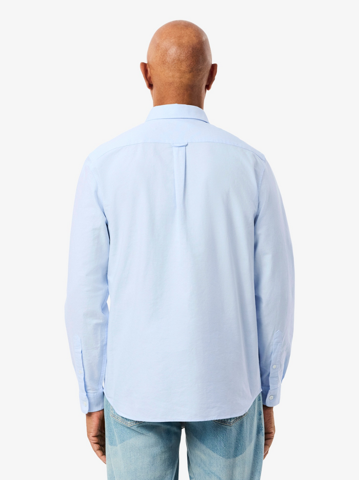 LACOSTE Regular Fit Oxford Shirt in light blue - side view highlighting the comfortable regular fit and classic sleeve design