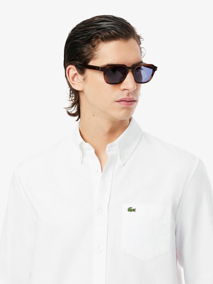 LACOSTE Regular Fit Oxford Shirt in white - side view highlighting the comfortable regular fit and classic sleeve design