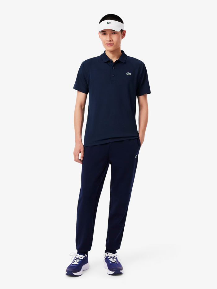 LACOSTE Regular Fit UV Protect Sport Polo Shirt Midnight Blue - MAISONDEFASHION.COM