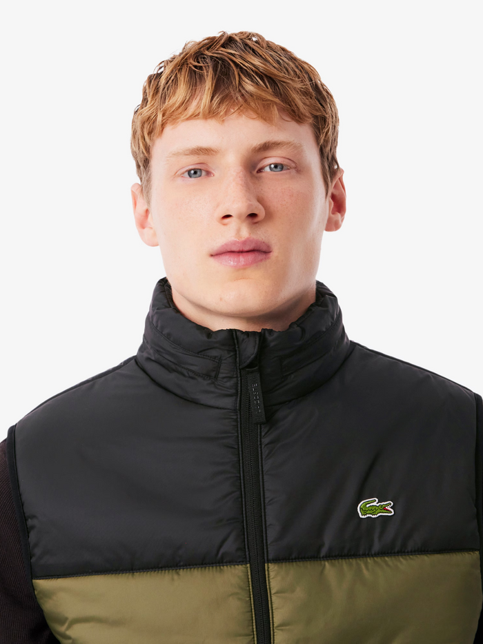 LACOSTE Green Sleeveless Jacket - close-up detail of water-repellent fabric texture and premium craftsmanship