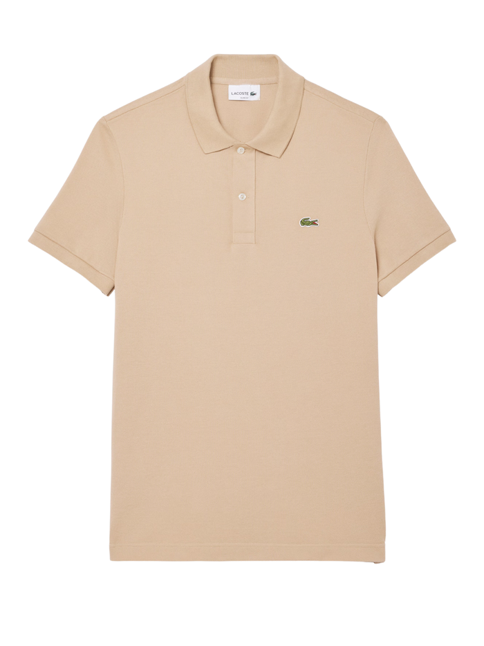 Man wearing beige LACOSTE L.12.12 slim fit piqué polo shirt with signature green crocodile logo and two-button placket