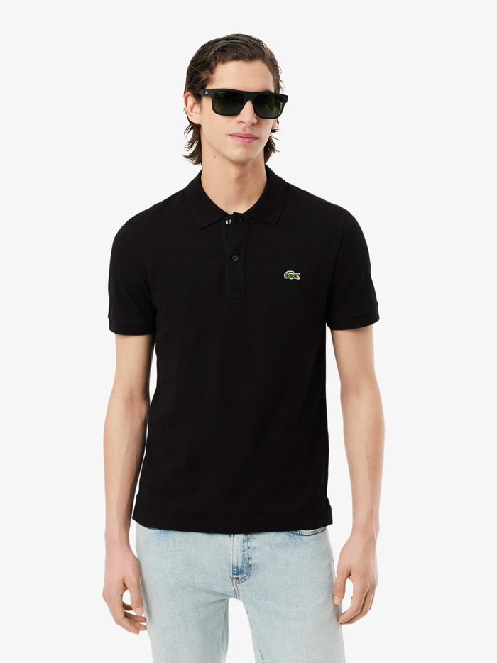 Back view of LACOSTE black slim fit polo shirt showing classic piqué cotton texture and tailored fit