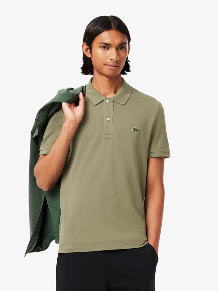 Back view of LACOSTE khaki green slim fit polo shirt showing classic piqué cotton texture and tailored fit