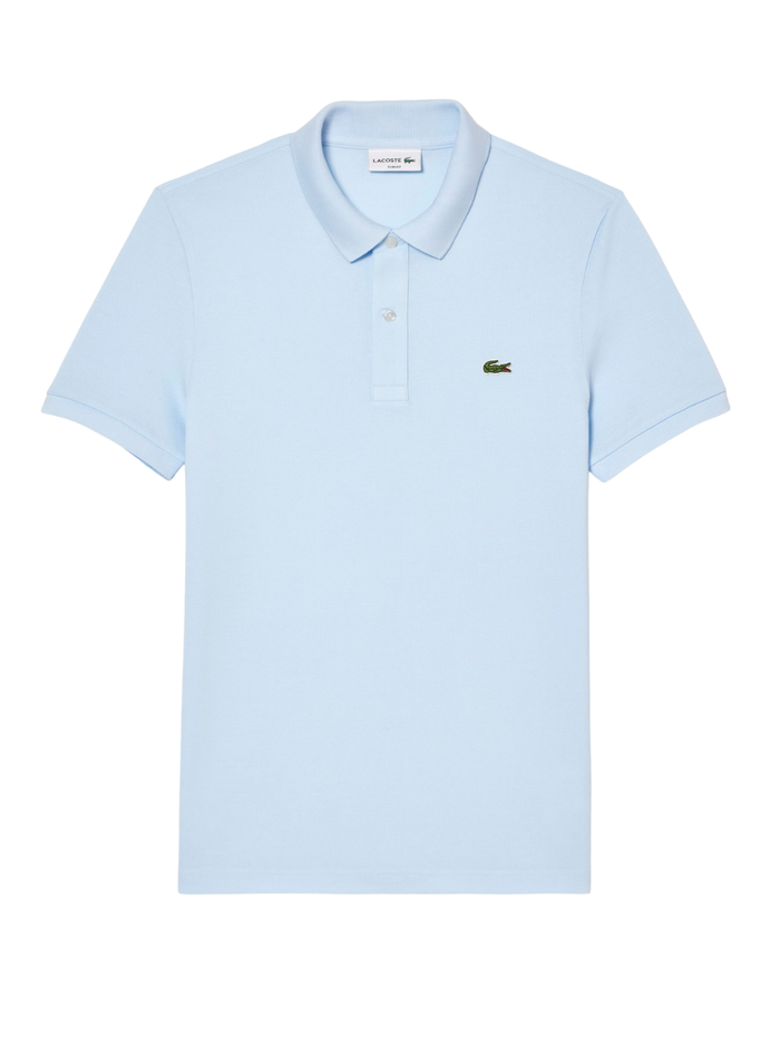 Man wearing light blue LACOSTE L.12.12 slim fit piqué polo shirt with signature green crocodile logo and two-button placket